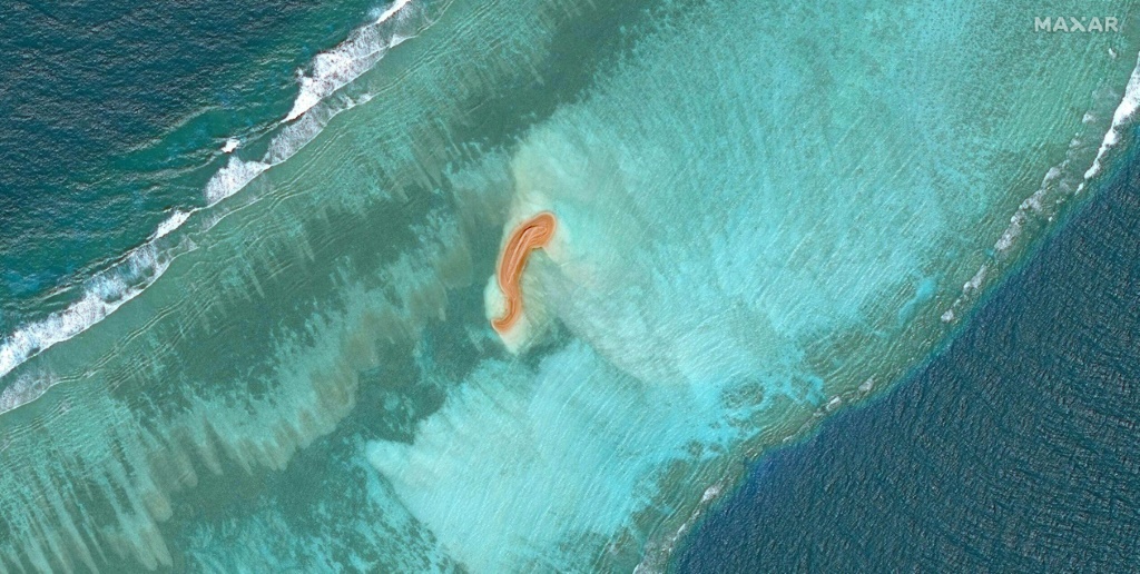    صورة التقطتها مجموعة "ماكسار تكنولوجيز" بالأقمار الاصطناعية لشعاب إيلداد في أرخبيل سبراتليز ببحر الصين الجنوبي في 04 تشرين الثاني/نوفمبر 2022 (ا ف ب)