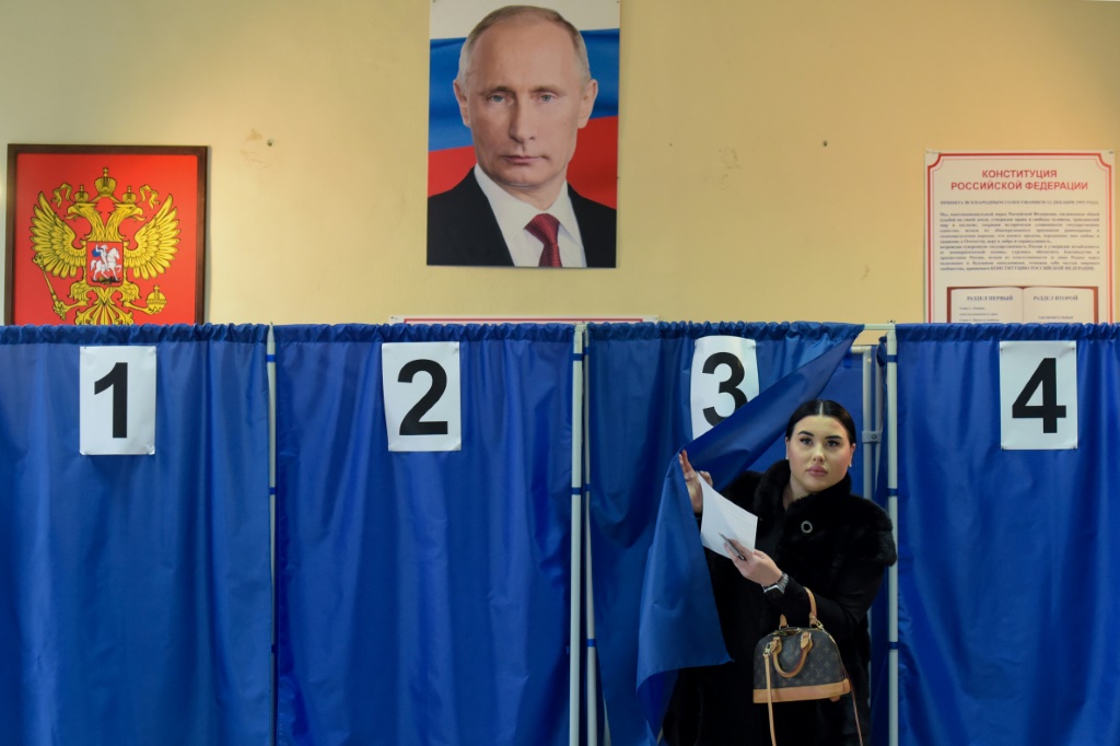 أجريت الانتخابات الرئاسية في روسيا دون أي مرشحين معارضين حقيقيين (ا ف ب)